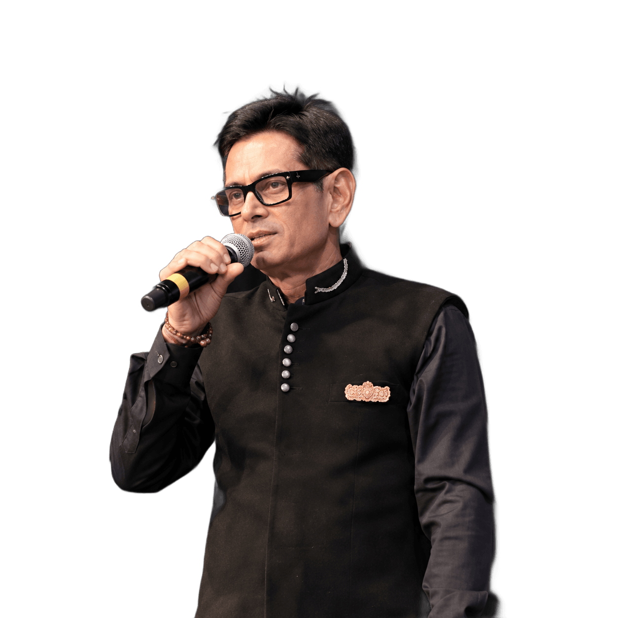 Kirti Varsani performing with a microphone